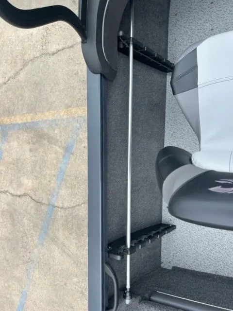 Slide: The Image of 2024 Crestliner HAWK 1650 boat interior with seating and rod storage. - 19