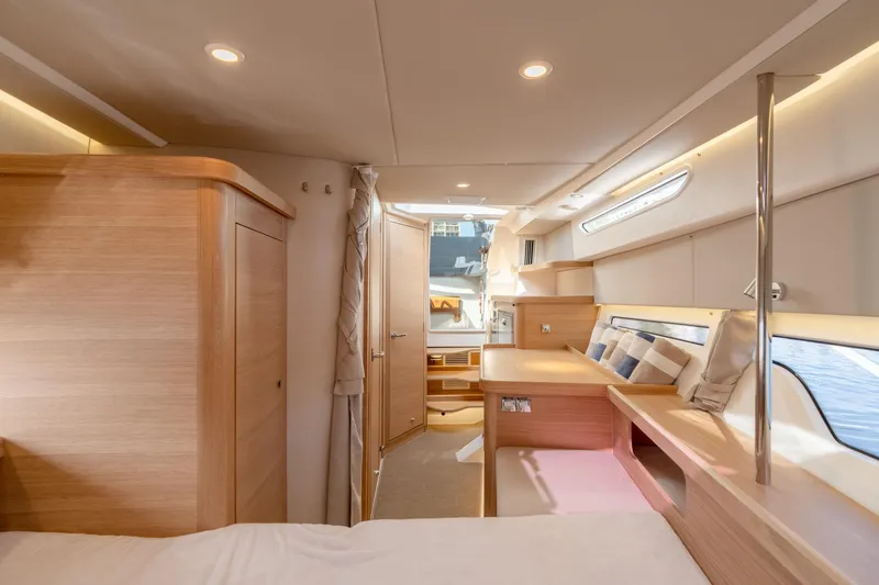 Slide: The Image of Interior of 2024 Nimbus Weekender 11 #20 yacht with modern wooden furnishings. - 22