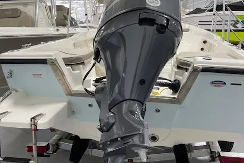 Slide: The Image of 2023 Key West 1720 Center Console boat with outboard motor on trailer. - 10