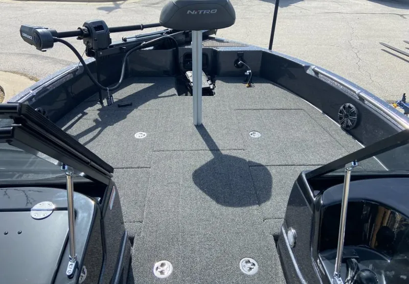 Slide: The Image of 2024 Nitro ZV19 Sport Pro boat interior with fishing seat and trolling motor. - 4