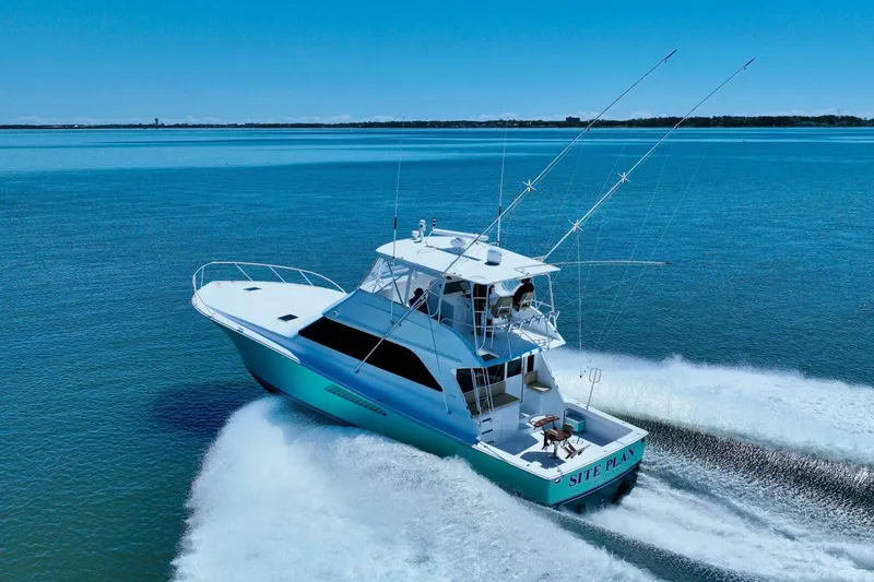 Slide: The Image of Viking 55 Convertible yacht cruising on open water, 2000 model. - 6