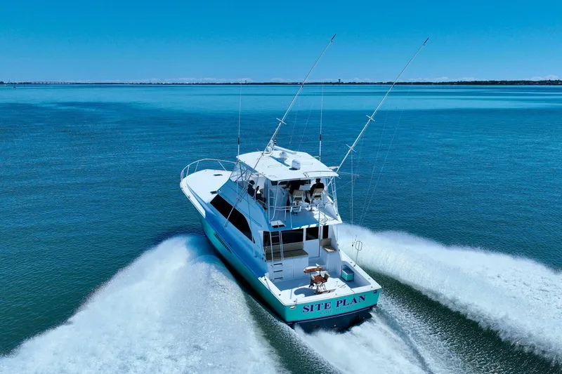 Slide: The Image of Viking 55 Convertible yacht cruising on open water, 2000 model. - 7