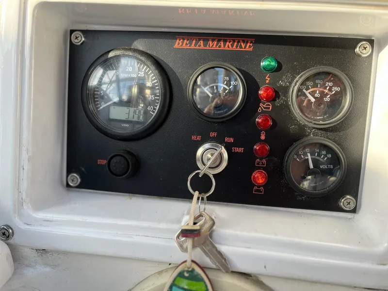 Slide: The Image of Control panel of a 1983 Hunter 27 sailboat with Beta Marine engine. - 19