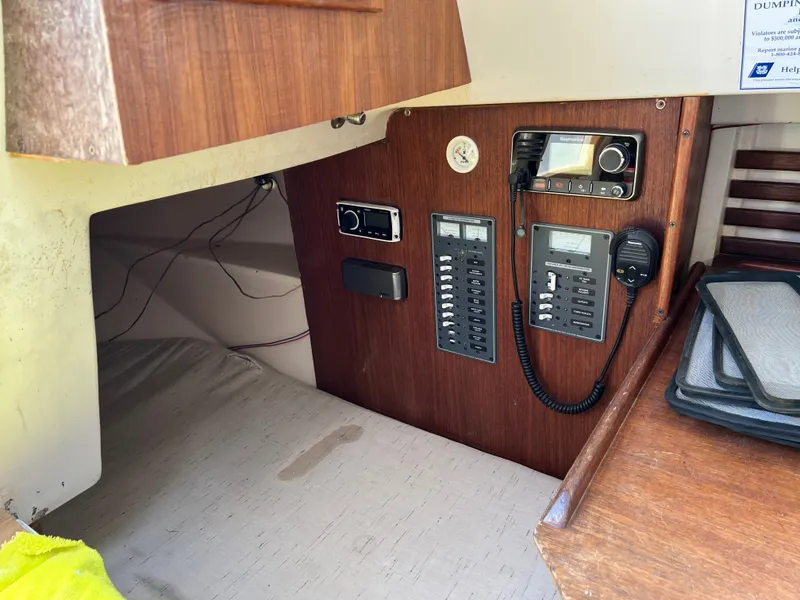 Slide: The Image of Control panel inside a 1983 Hunter 27 sailboat cabin. - 24