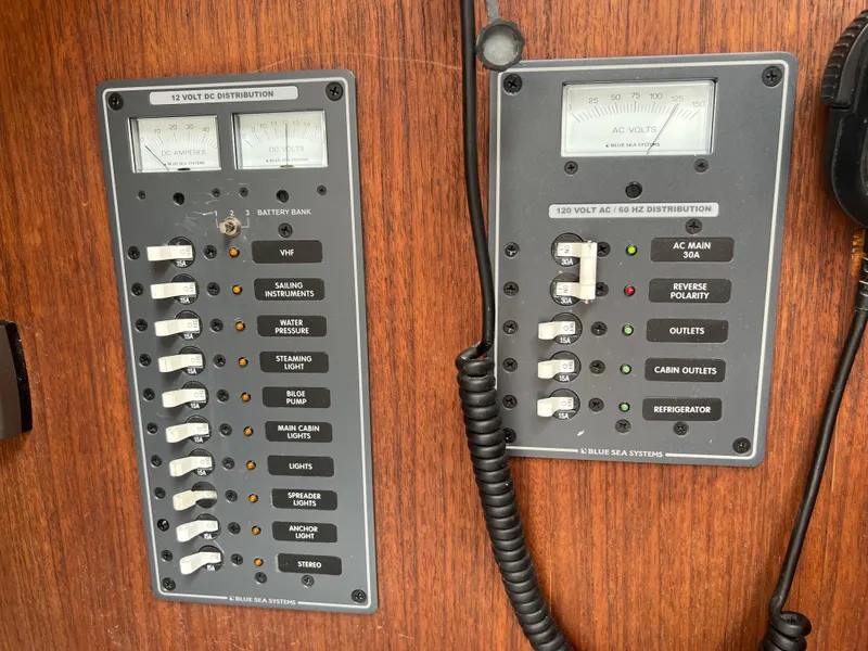 Slide: The Image of Electrical control panels on a 1983 Hunter 27 sailboat. - 26