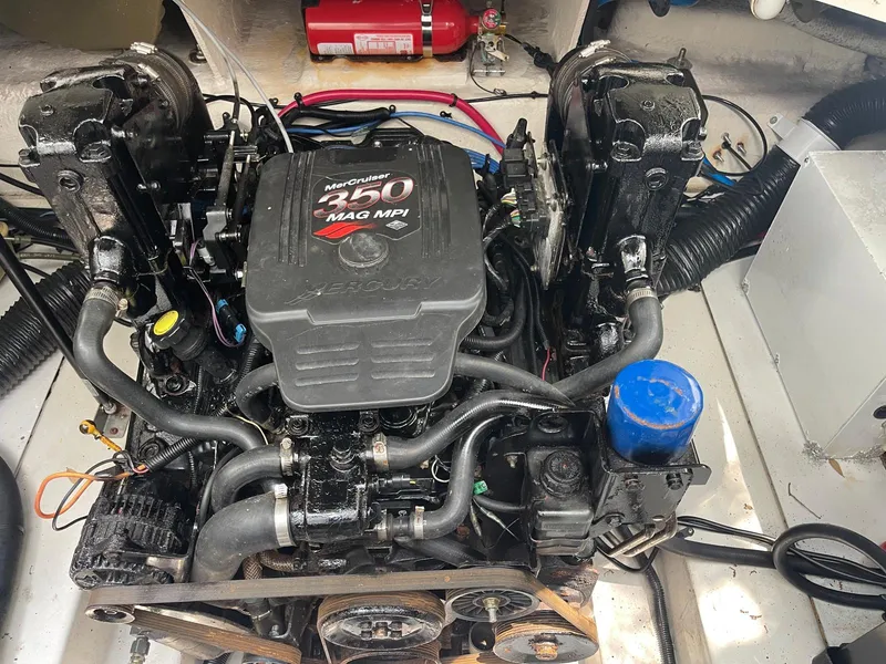 Slide: The Image of 2006 Sea Ray 270 Amberjack engine compartment with MerCruiser 250 MAG MPI engine. - 19