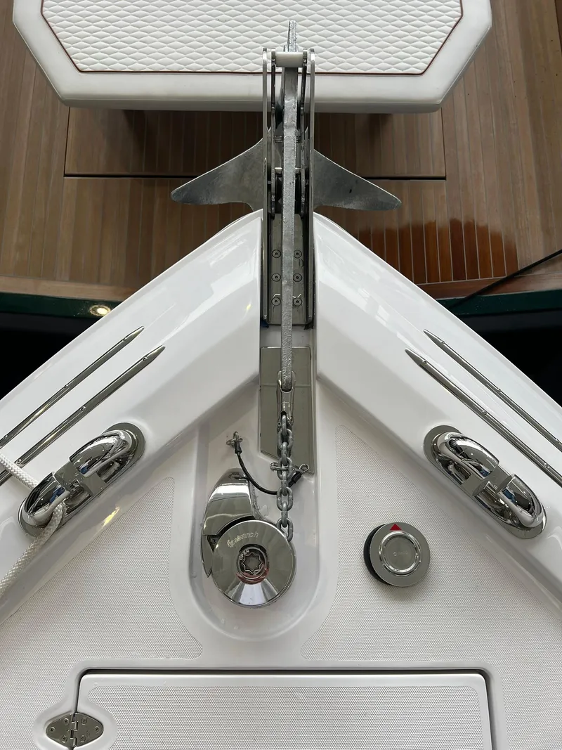 Slide: The Image of Ferretti Yachts 500 2024 model bow with anchor and deck details. - 15