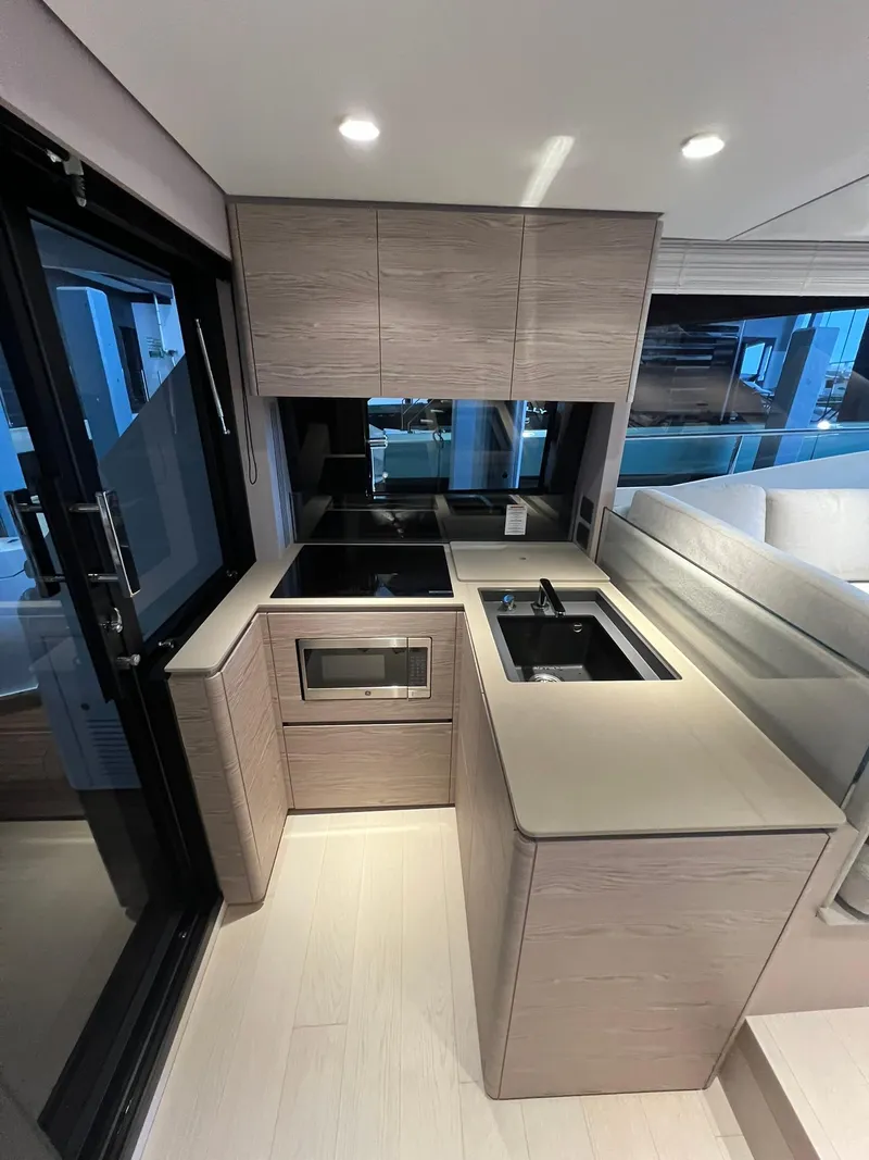 Slide: The Image of Modern kitchen interior of 2024 Ferretti Yachts 500 with sleek cabinetry and appliances. - 21