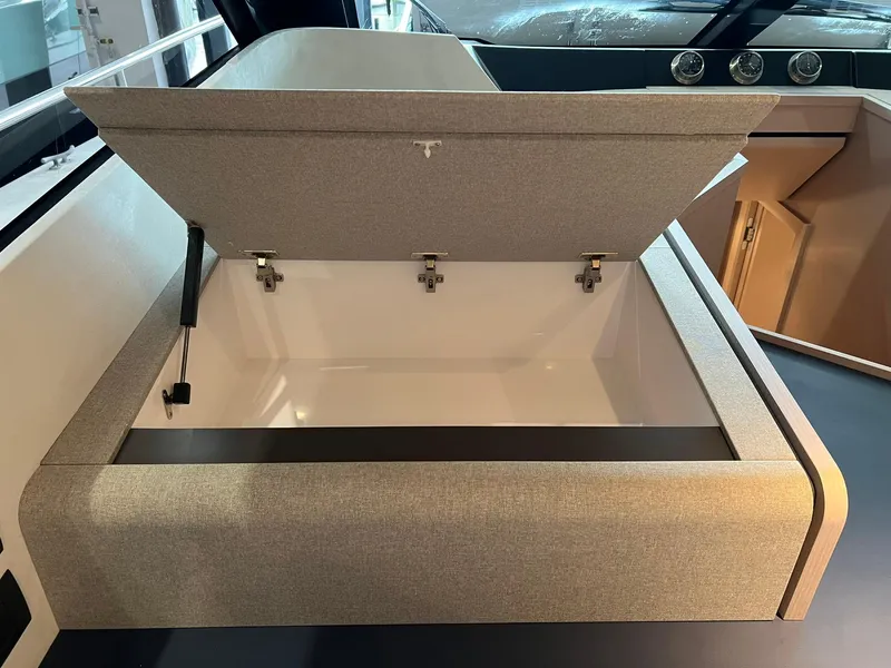 Slide: The Image of Open storage compartment on 2024 Ferretti Yachts 500 model. - 24