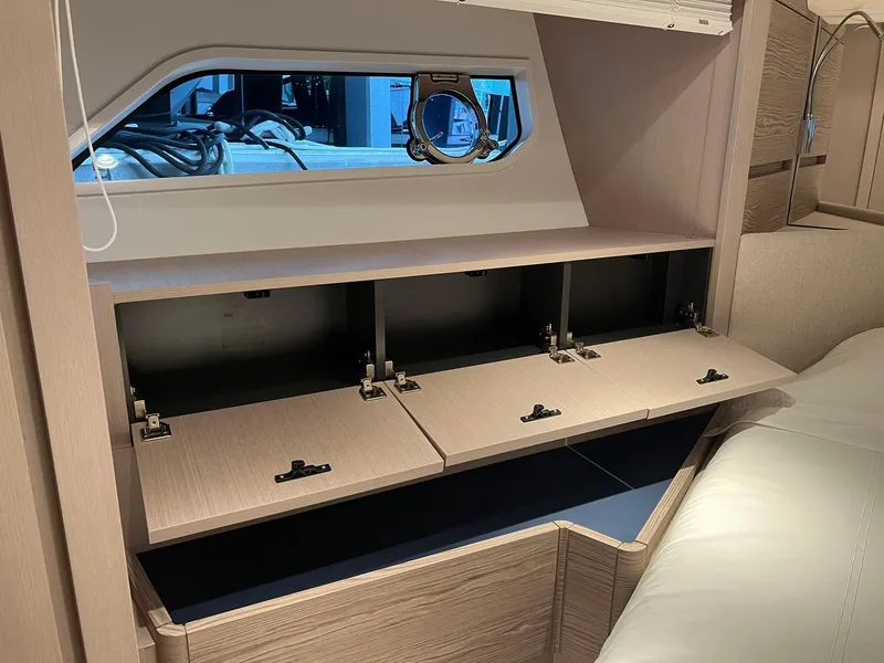 Slide: The Image of Interior storage compartments in 2024 Ferretti Yachts 500 cabin. - 41