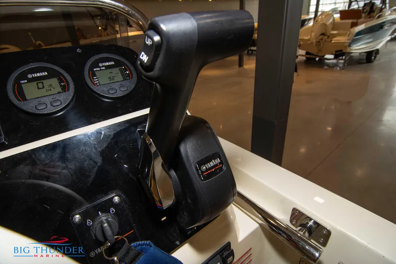 Slide: The Image of 2024 Capoforte SX200 boat dashboard with Yamaha controls and gauges at Big Thunder Marine. - 24