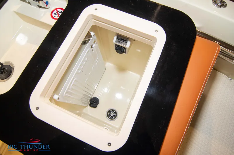 Slide: The Image of Capoforte SX200 2024 boat storage compartment with drainage and seating area. - 29