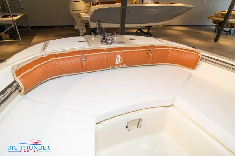 Slide: The Image of 2024 Capoforte SX200 boat interior with tan leather seating at Big Thunder Marine. - 34