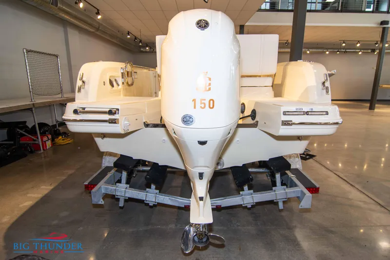 Slide: The Image of 2024 Capoforte SX200 boat on trailer in showroom. - 4