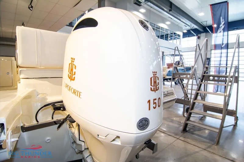 Slide: The Image of 2024 Capoforte SX200 boat engine in showroom. - 5