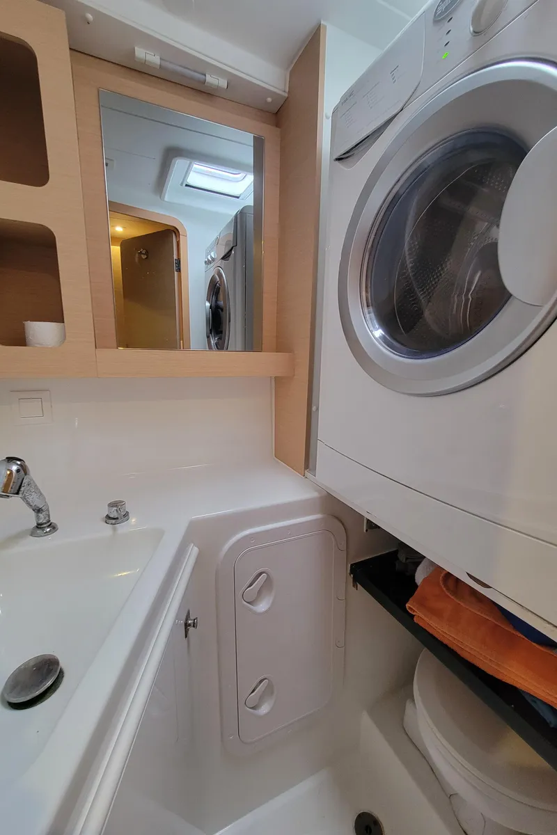 Slide: The Image of Half bath w/washer/dryer - 28