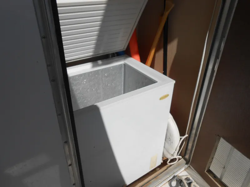 Slide: The Image of Open chest freezer on a 2000 Skipperliner Custom Houseboat. - 29