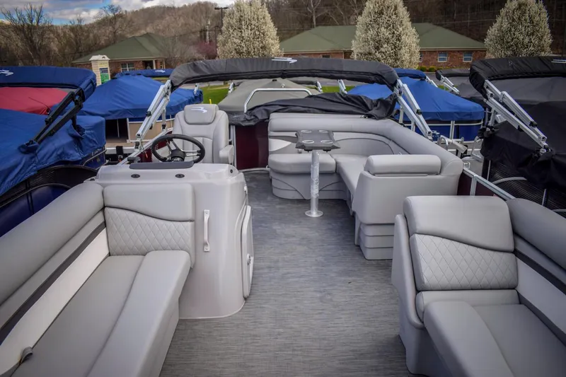Slide: The Image of 2023 Bennington 21 SLSP pontoon boat with spacious seating and modern design. - 3
