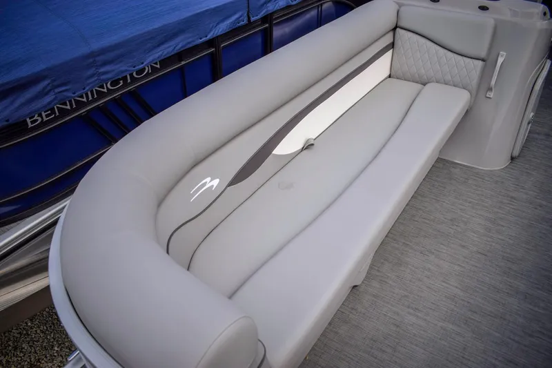 Slide: The Image of 2023 Bennington 21 SLSP boat with gray cushioned seating. - 4