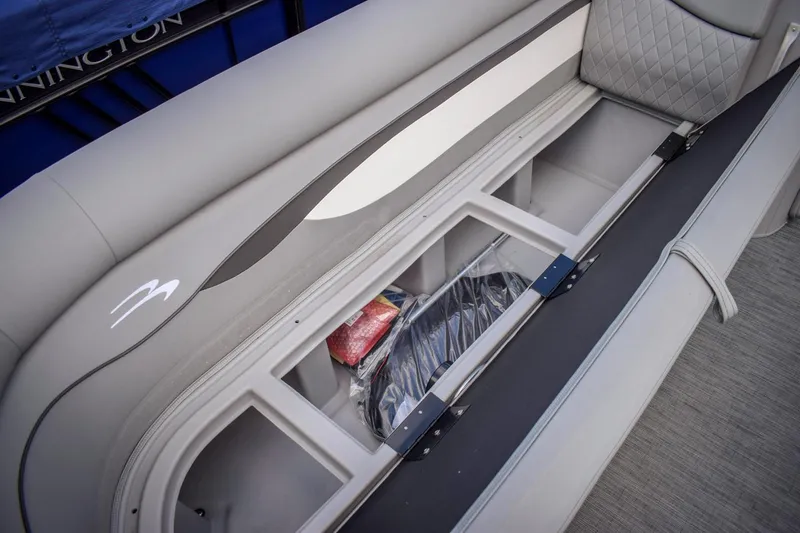 Slide: The Image of 2023 Bennington 21 SLSP boat with open storage compartment. - 6