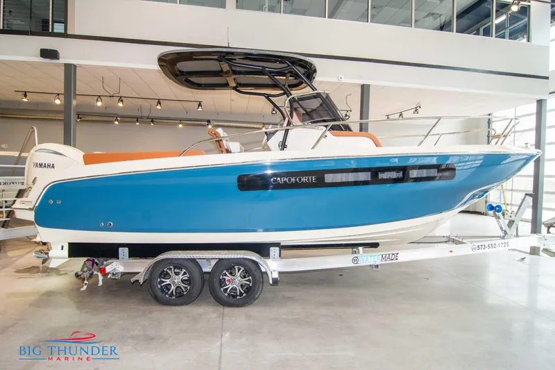 The Image of 2024 Capoforte CX240 boat on a trailer in a showroom. - 0