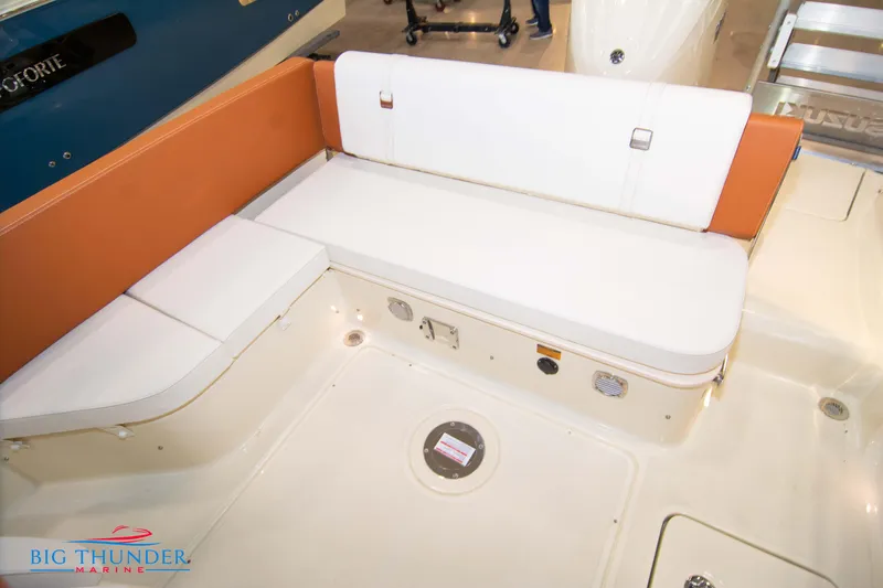 Slide: The Image of Capoforte CX240 2024 boat interior seating area at Big Thunder Marine. - 17