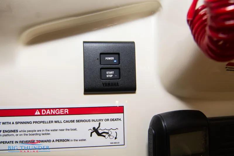 Slide: The Image of Capoforte CX240 2024 boat dashboard with Yamaha power and start/stop buttons. - 30