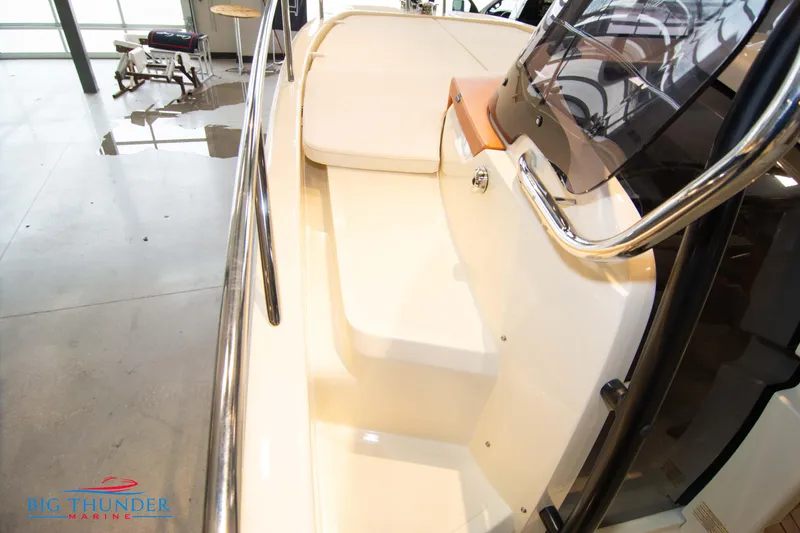 Slide: The Image of 2024 Capoforte CX240 boat interior with seating and railing. - 36