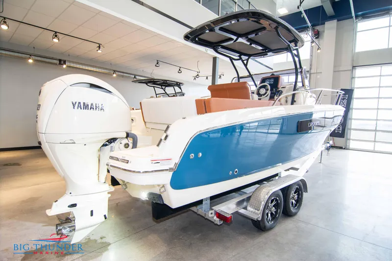 Slide: The Image of 2024 Capoforte CX240 boat with Yamaha engine in showroom. - 4