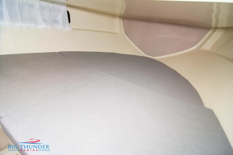 Slide: The Image of 2024 Capoforte CX240 cabin interior with cushioned sleeping area. - 44