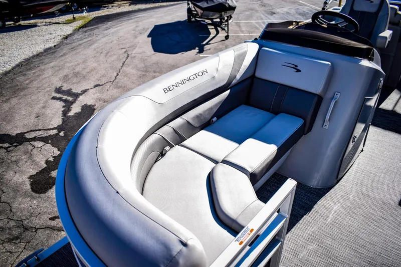 Slide: The Image of 2023 Bennington 22 SXCWSP boat interior with luxurious seating. - 10