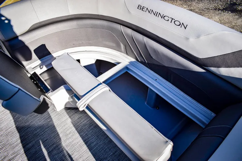 Slide: The Image of 2023 Bennington 22 SXCWSP boat interior seating and storage compartment. - 12