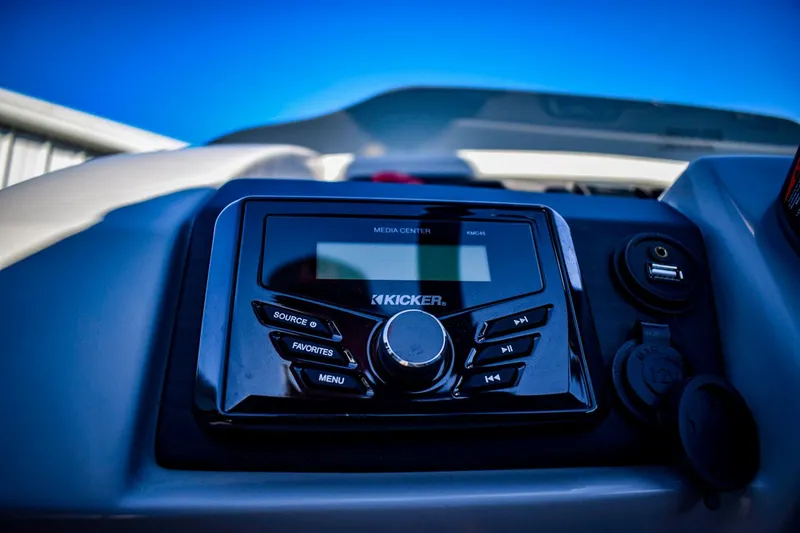 Slide: The Image of Close-up of the 2023 Bennington 22 SXCWSP boat's Kicker media center. - 24
