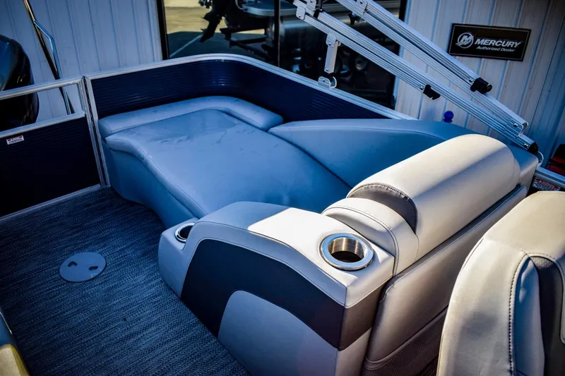 Slide: The Image of 2023 Bennington 22 SXCWSP boat interior with comfortable seating and cup holders. - 29