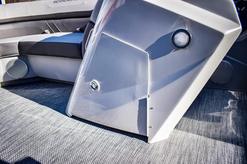 Slide: The Image of 2023 Bennington 22 SXCWSP boat interior with seating and speaker system. - 33