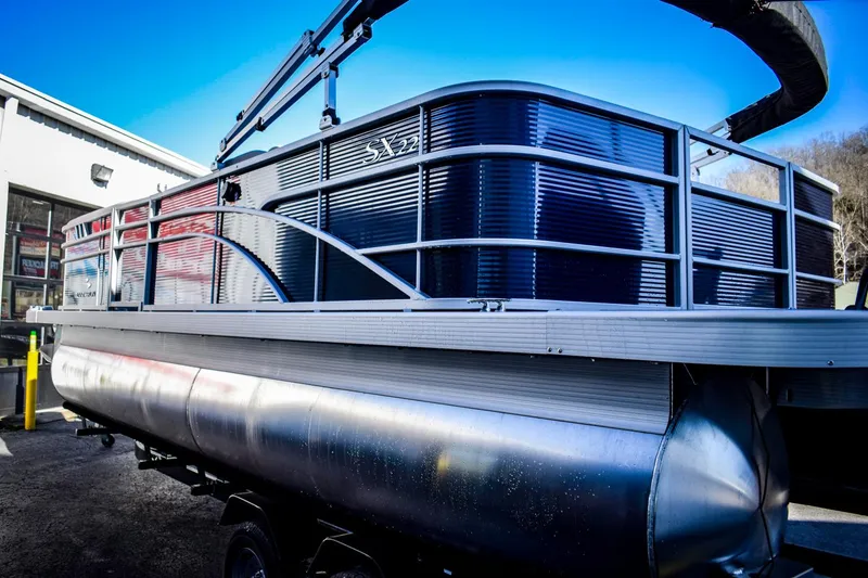 Slide: The Image of 2023 Bennington 22 SXCWSP pontoon boat with sleek design and modern features. - 4