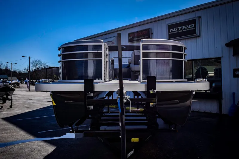 Slide: The Image of 2023 Bennington 22 SXCWSP pontoon boat at a dealership. - 8