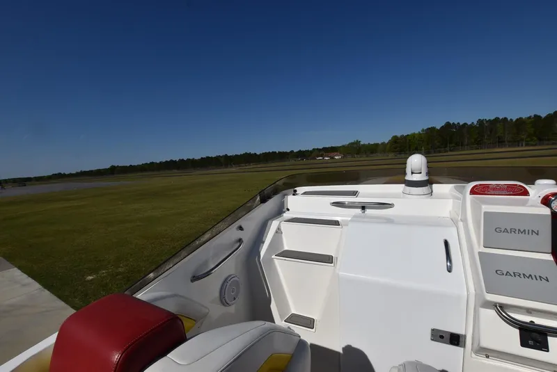Slide: The Image of Interior view of 2002 Black Thunder 460 EC boat with Garmin navigation system. - 12