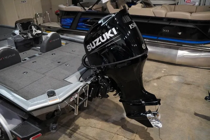 Slide: The Image of 2024 Vexus AVX1980C boat with Suzuki 150 outboard motor in showroom. - 3