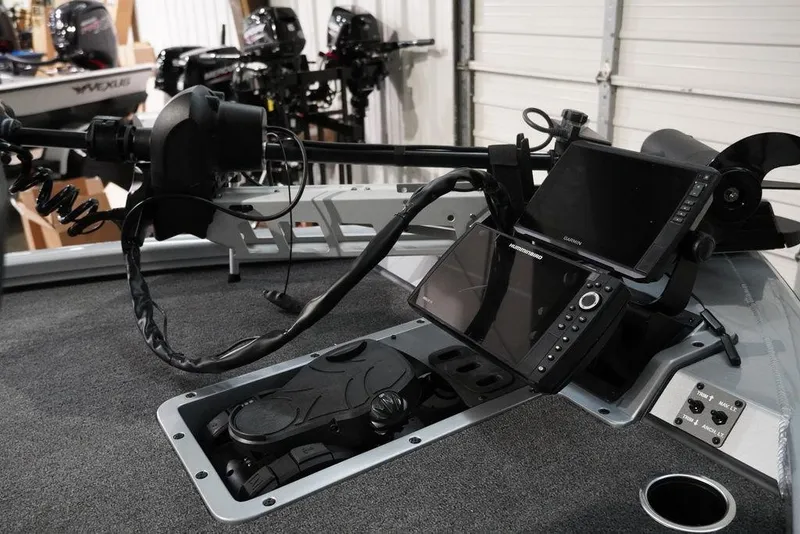 Slide: The Image of 2024 Vexus AVX1980C boat dashboard with advanced navigation and fish-finding equipment. - 4