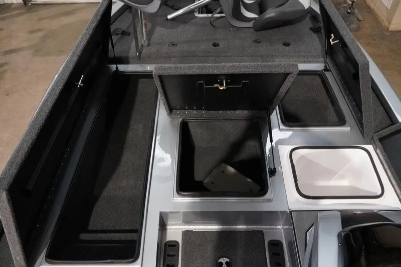 Slide: The Image of 2024 Vexus AVX1980C boat interior with storage compartments and seating. - 6