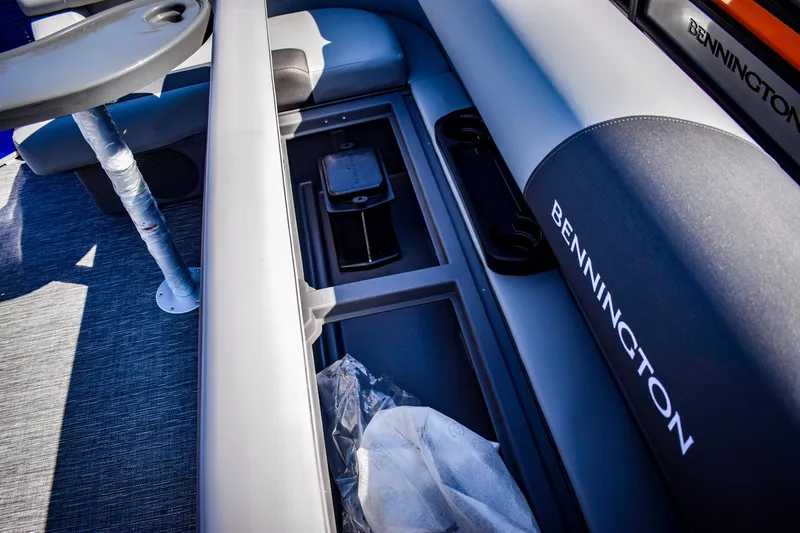 Slide: The Image of 2024 Bennington 20 SVLSR pontoon boat interior storage compartment. - 11