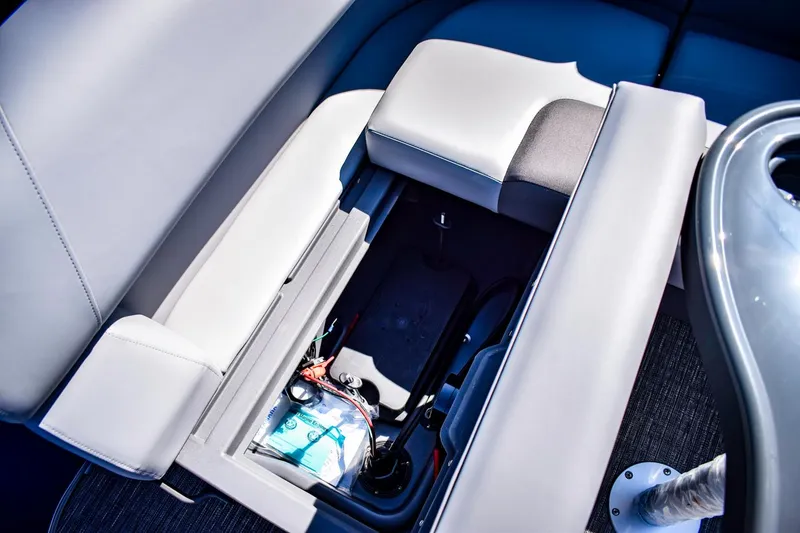 Slide: The Image of 2024 Bennington 20 SVLSR boat storage compartment with open seat. - 12