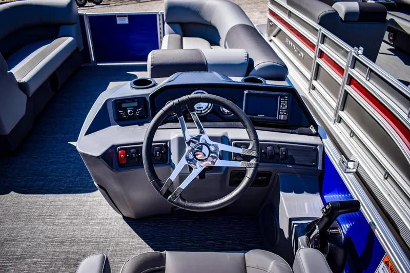 Slide: The Image of 2024 Bennington 20 SVLSR boat interior with steering wheel and seating. - 13