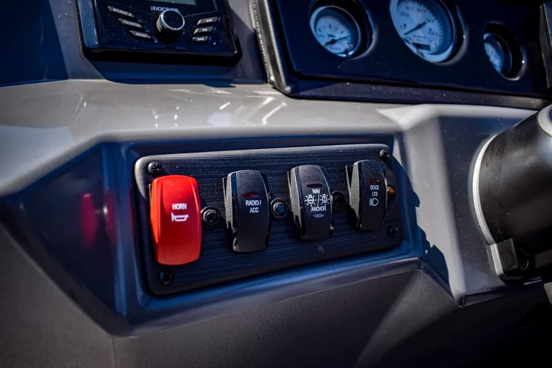 Slide: The Image of Control panel of 2024 Bennington 20 SVLSR boat with switches and gauges. - 17