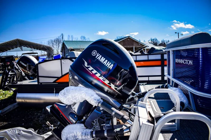 Slide: The Image of 2024 Bennington 20 SVLSR pontoon boat with Yamaha VMAX outboard motor. - 20