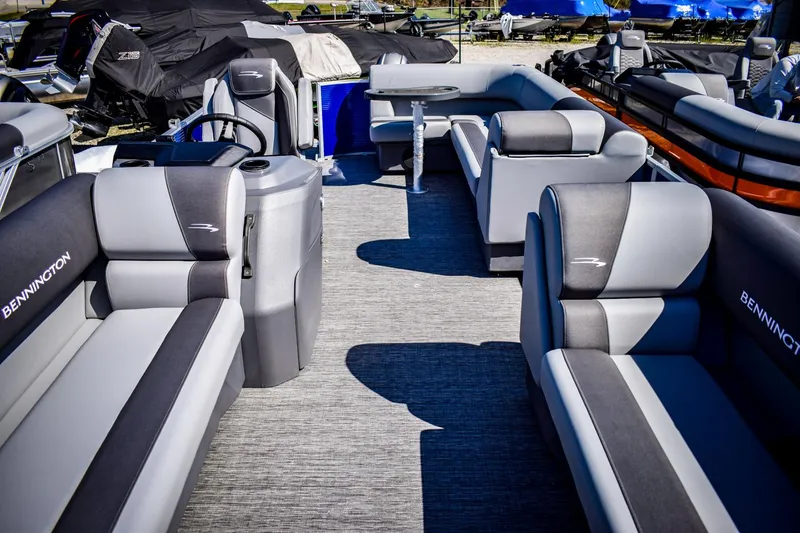 Slide: The Image of 2024 Bennington 20 SVLSR pontoon boat with spacious seating and modern design. - 4