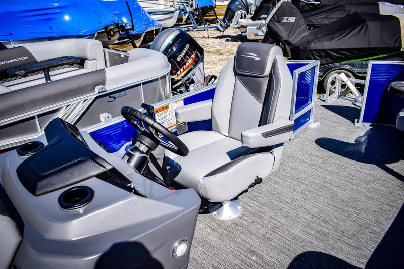 Slide: The Image of 2024 Bennington 20 SVLSR pontoon boat captain's chair and helm station. - 9