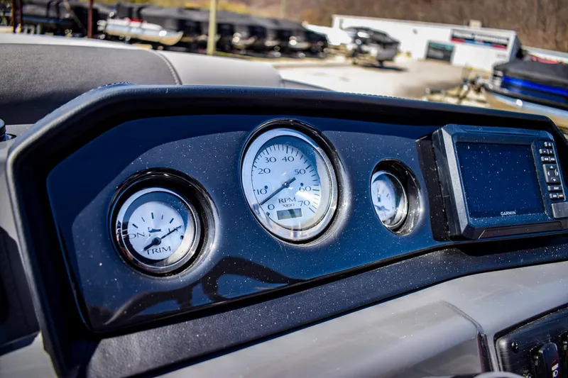 Slide: The Image of Dashboard of 2024 Bennington 20 SVSBSR boat with gauges and Garmin display. - 13