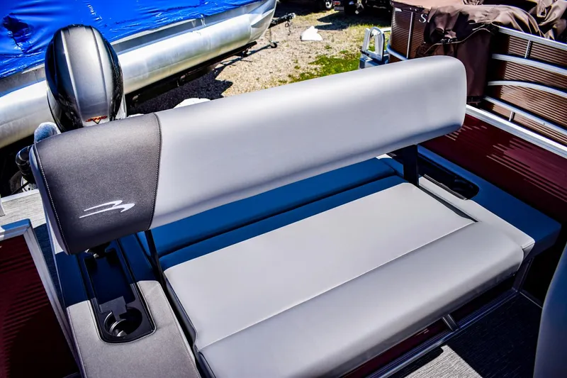 Slide: The Image of 2024 Bennington 20 SVSBSR boat seat with gray upholstery and cup holder. - 19